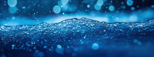 Wall Mural - A blue body of water with a lot of bubbles