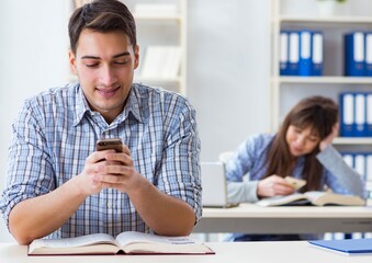 Sticker - Students sitting and studying in classroom college