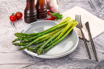 Wall Mural - Vegan cuisine - Boiled asparagus with oil