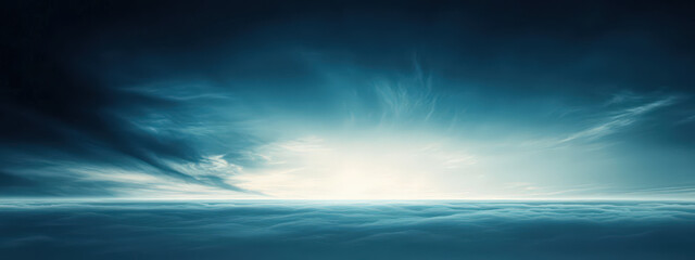 Wall Mural - A blue sky with clouds and a sun in the distance