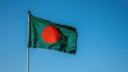 Flag of Bangladesh, waving flag. Independence Day, blue sky background