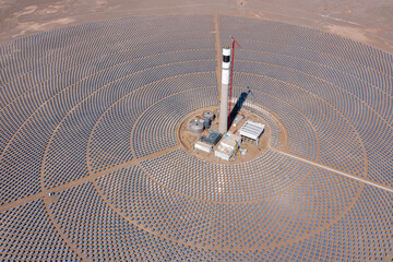 Aerial photo of molten salt tower solar thermal power plant under construction in Jiuquan, Gansu Province, China