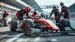 © kinara art design - Red race car on a pit stop with crew members around it.
