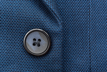 Sticker - Close-up of a button on a men's blue suit. Button on a suit