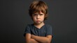 © IR-Creative - 'Moody Young Boy with Folded Arms - Expressing Emotions'
