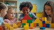 © Patrick - Creative Multiethnic Friends Playing Fun Games in Kindergarten. International Boys and Girls Constructing a House Out of Colorful Building Blocks. Teacher Educating Children in Modern Daycare Center