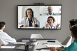 © fizkes - Group of diverse doctors engaged in medical council, take part in seminar, video conference with experienced young and mature GP share opinions, gathered together for decision-making in meeting room
