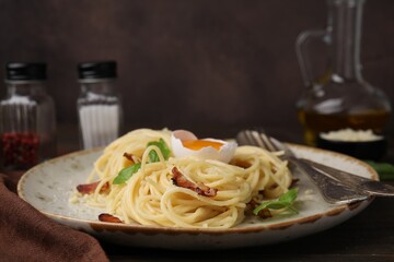 Wall Mural - Delicious pasta Carbonara served on wooden table