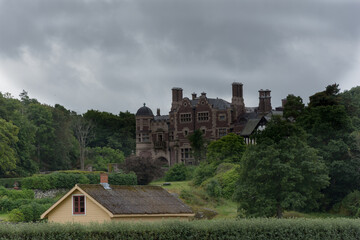 Stone castle with trees and blue sky