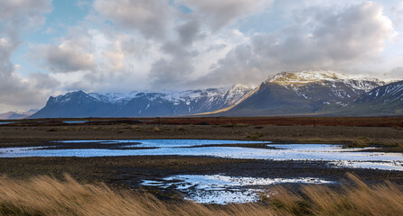 Poster - View during auto trip in West Iceland highlands, Snaefellsnes peninsula, Snaefellsjokull National Park. Spectacular volcanic tundra landscape with mountains, craters, lakes, gravel roads.