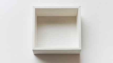 Top view of an empty white paper box with a transparent window, isolated on white