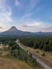 Wall Mural - Scenic Road in Mountain Valley, Canadian Countryside. Aerial Sunrise. Alberta, Canada