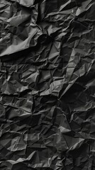Poster - Detailed texture reveals the complex creases of crumpled black paper under soft lighting, emphasizing depth and contrast
