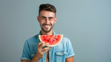 Male holding a fresh sweet ripe watermelon slice