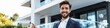 © Maxime - Smiling Man in Suit Outside Modern Building