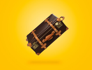 Poster - Vintage suitcase in air on yellow background