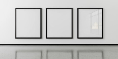 Aufkleber - Three empty black frames are hanging on a white wall in a modern room