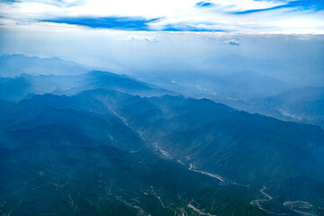 Wall Mural - aerial view of mountain range in fog