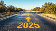 © Keitma - Road to 2025 with an empty road with written 2025 and arrow pointing towards the horizon to represent the future and positivity and success of the new year 2025
