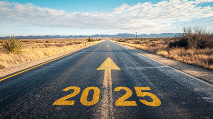 Road to 2025 with an empty road with written 2025 and arrow pointing towards the horizon to represent the future and positivity and success of the new year 2025