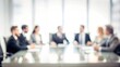© Mari - Unfocused Corporate Meeting - Gentle blur effect over a corporate meeting scene with people.