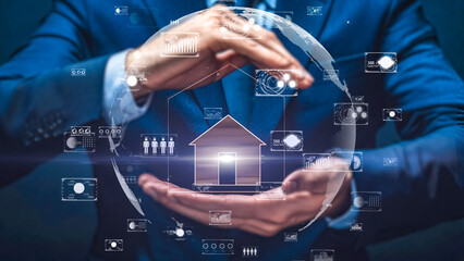 Corporate professional holding a house model, highlighting real estate and technology integration