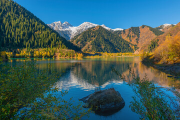 Picturesque mountain lake Issyk in the outskirts of the Kazakh city of Almaty on an autumn morning