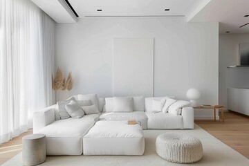 Bright and airy minimal white living room with a large white sofa and minimal decor elements.