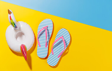 Poster - A vibrant summer vacation scene with flip flops and a floating flamingo