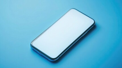 A black smartphone lies on a blue background with a blank screen.