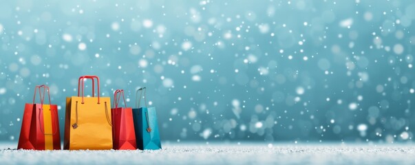 Colorful shopping bags against a snowy backdrop create a festive atmosphere for winter sales and holiday shopping.