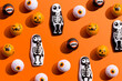 © Westend61 - Halloween themed candy against orange background