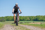 Man on a mountain bike.