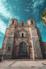 Poster - A large stone building with a clock tower, suitable for use in historical or architectural contexts