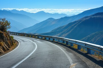 scenic motor road with sharp curves clear sky and mountains for road trips and hikes