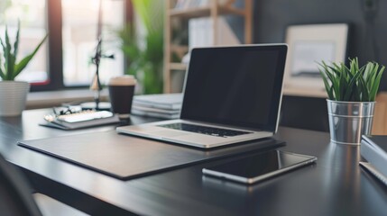 Poster - A minimalist workspace featuring a laptop, smartphone, and a potted plant on a sleek black desk. It symbolizes productivity, technology, and a touch of nature in a professional environment.