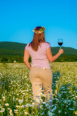 Sticker - Girl with a glass of wine in nature