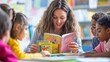 © keetazalay - A close-up image of a teacher in a bright and colorful elementary school classroom, sitting at a small table with a group of young students, helping them with a reading assignment, using picture