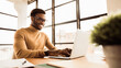 © Prostock-studio - Office Work Concept. Smiling black businessman working on laptop in modern office. Panorama, free space