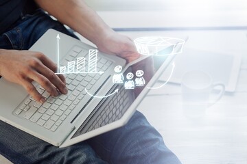 Canvas Print - Business finance graph on background of person working on laptop