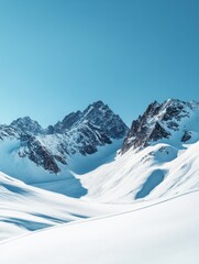 Canvas Print - The mountains are covered in snow and the sky is clear and blue