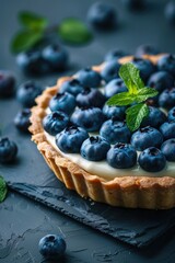 Wall Mural - A sweet dessert featuring a tart filled with blueberries and topped with whipped cream