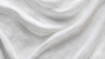 Poster - soft white fabric draped elegantly on a flat surface in a well-lit environment