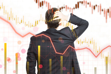 Poster - Businessman facing away, analyzing stock market graphs with declining trends on a white background. Concept of financial crisis, business decision making