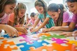© siripimon2525 - Children assembling a large puzzle as part of a teamwork exercise