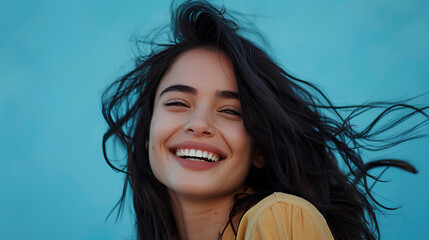 beautiful woman with her smile on a sky blue background