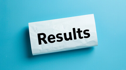 Aufkleber - Close-up of a crumpled paper with the word results on a blue background