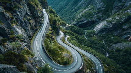 Wall Mural - Create an image of a mountain road with sharp turns and steep inclines, capturing the adventure and challenge of the drive.