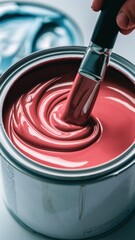 Wall Mural - A person painting a can of red paint with a brush, AI