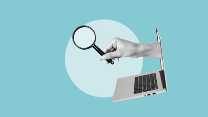 Hand out of computer with magnifying glass. Local seo concept. Internet search, computer search